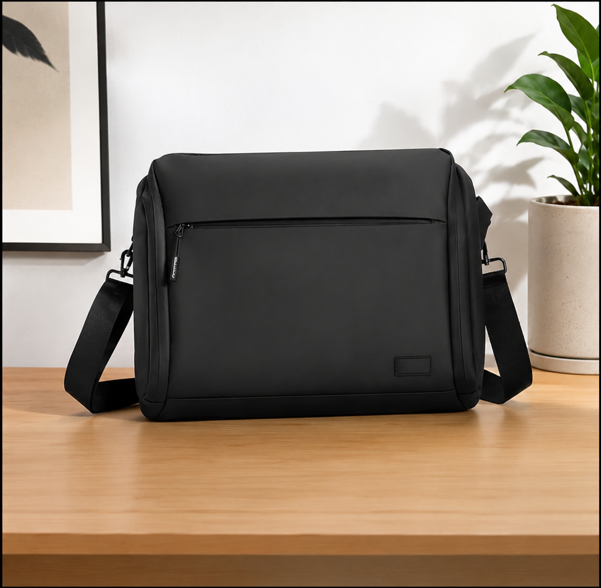 Black 14-inch nylon laptop shoulder bag with shoulder strap and front zippered pocket
