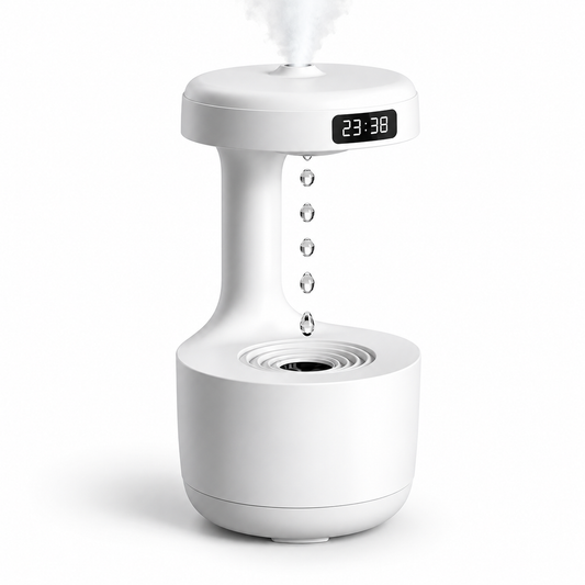 White anti-gravity LED humidifier with mist rising from the top and a floating droplet effect on a white background