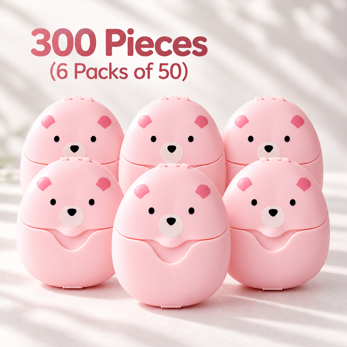 Six pink bear-shaped soap sheet cases with text stating 300 sheets total in six packs of 50