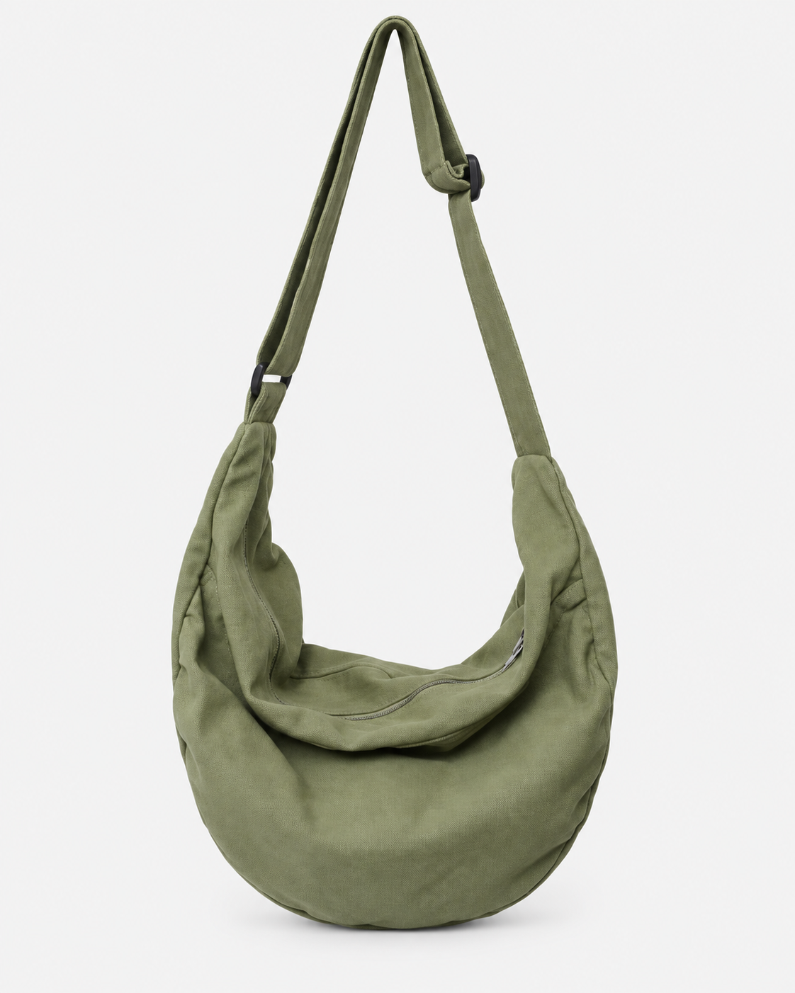 Green hobo shoulder bag with an adjustable strap, curved shape and zip closure on a white background
